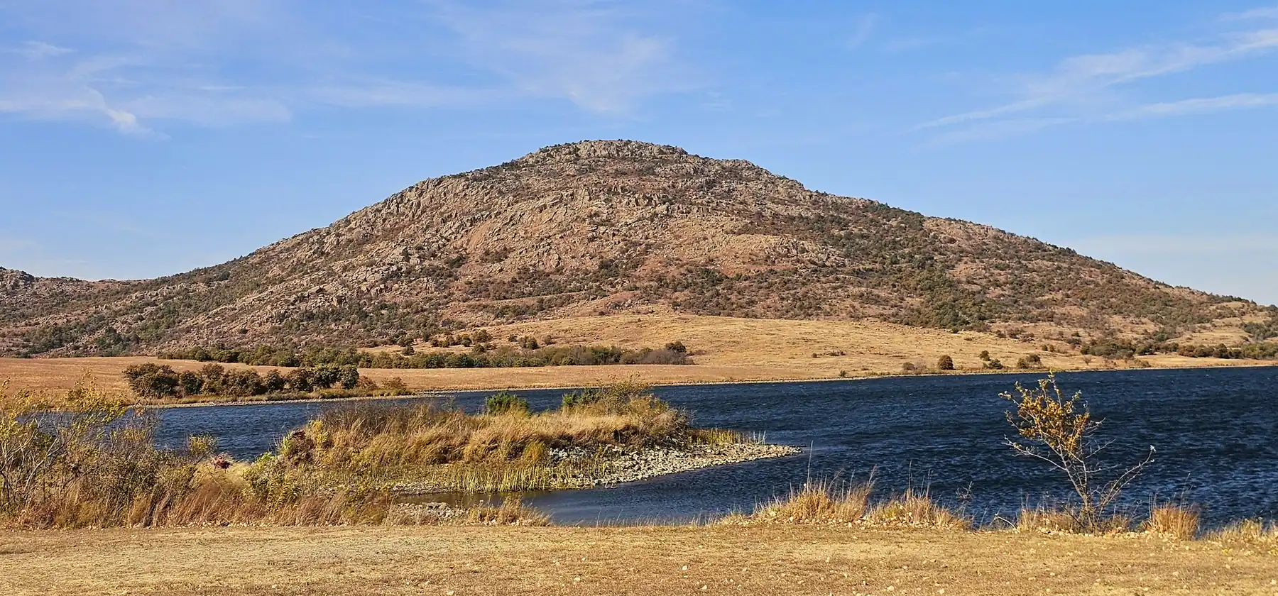 Mount Scott and a lake in the Wichita Mountains Wildlife Refuge near Lawton